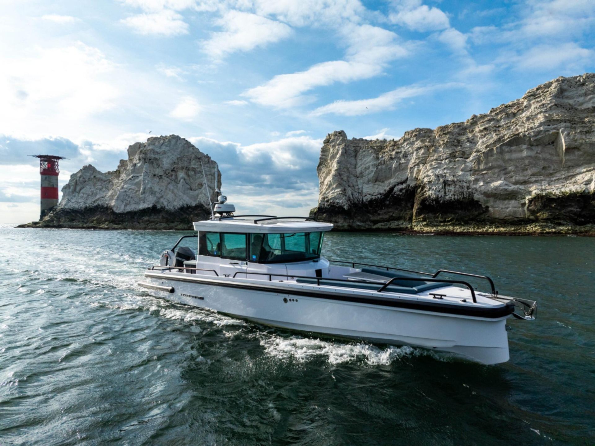 Charter boat cruising near The Needles from Lymington on the Solent